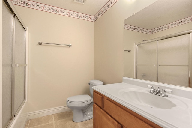 203 Foxwood Ct, Columbia, MO 65203 - bathroom with vanity and tile patterned floors
