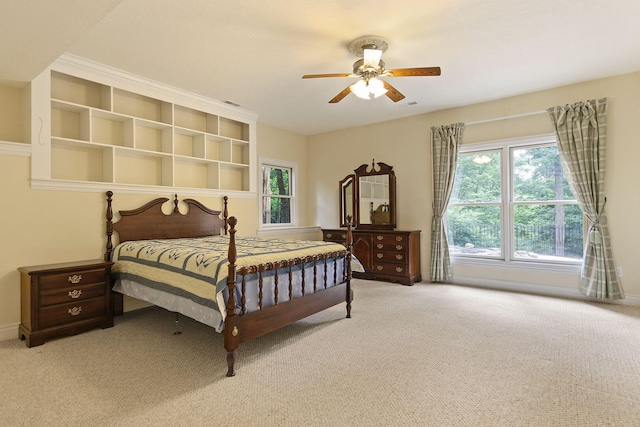 203 Foxwood Ct, Columbia, MO 65203 - bedroom featuring light colored carpet and a ceiling fan