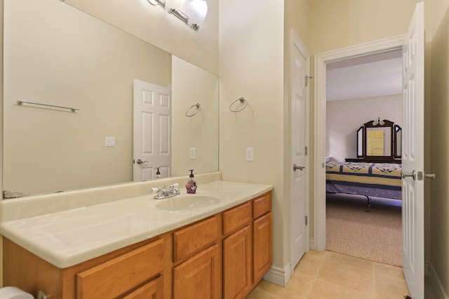 203 Foxwood Ct, Columbia, MO 65203 - ensuite bathroom featuring vanity and tile patterned floors
