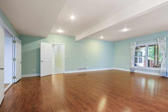 203 Foxwood Ct, Columbia, MO 65203 - spare room with wood finished floors, beamed ceiling, and recessed lighting