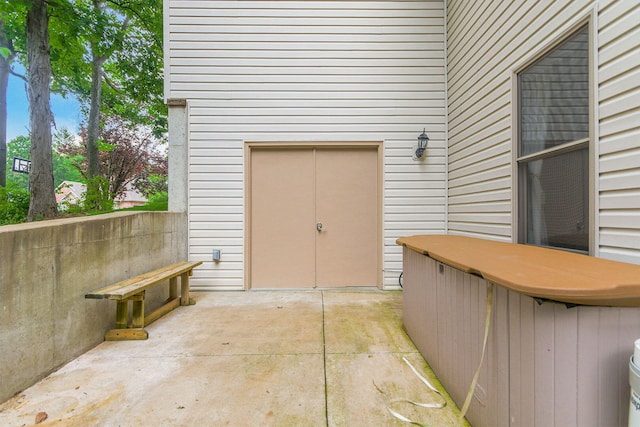 203 Foxwood Ct, Columbia, MO 65203 - entrance to property featuring a patio