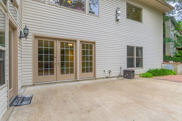 203 Foxwood Ct, Columbia, MO 65203 - view of patio featuring french doors