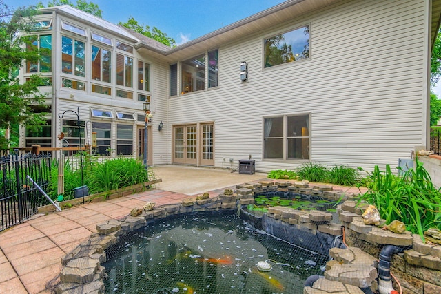 203 Foxwood Ct, Columbia, MO 65203 - back of house with a patio area