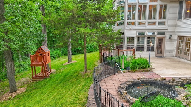 203 Foxwood Ct, Columbia, MO 65203 - view of yard with a patio and an outdoor fire pit