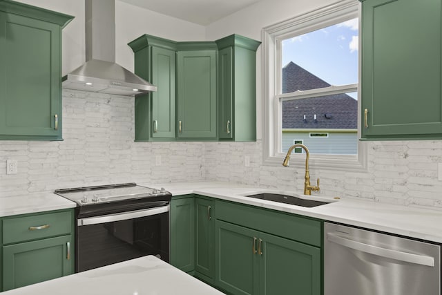 1704 Stillpoint Ct, Columbia, MO 65203 - kitchen with stainless steel appliances, wall chimney exhaust hood, and green cabinetry