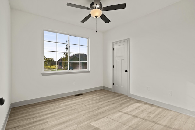 1704 Stillpoint Ct, Columbia, MO 65203 - spare room with light wood finished floors and ceiling fan