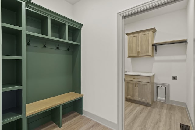 1704 Stillpoint Ct, Columbia, MO 65203 - mudroom with light wood finished floors and baseboards
