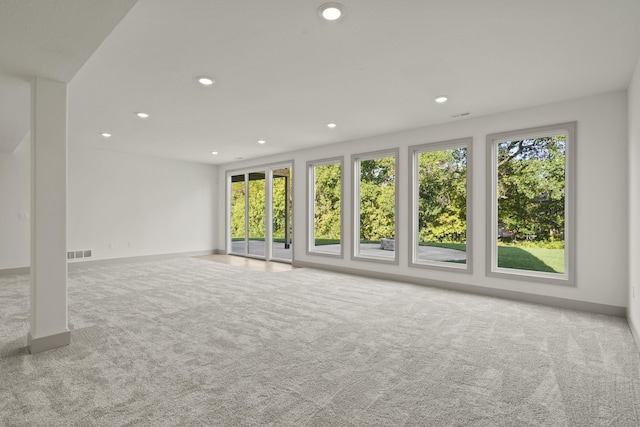 1704 Stillpoint Ct, Columbia, MO 65203 - unfurnished living room with carpet floors, healthy amount of natural light, and recessed lighting