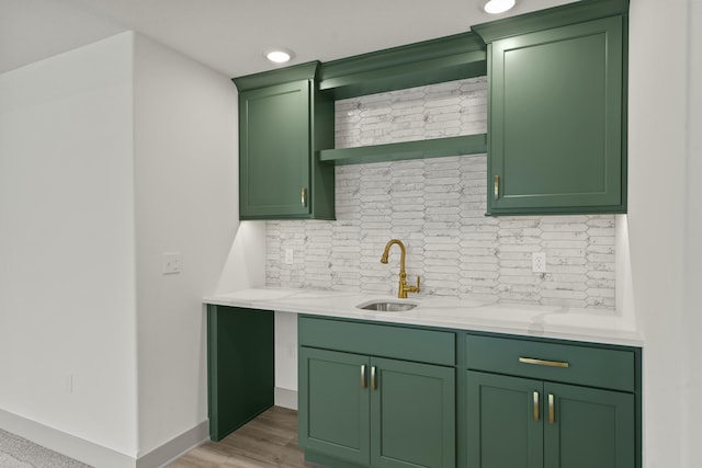 1704 Stillpoint Ct, Columbia, MO 65203 - bar with backsplash and light wood-style floors