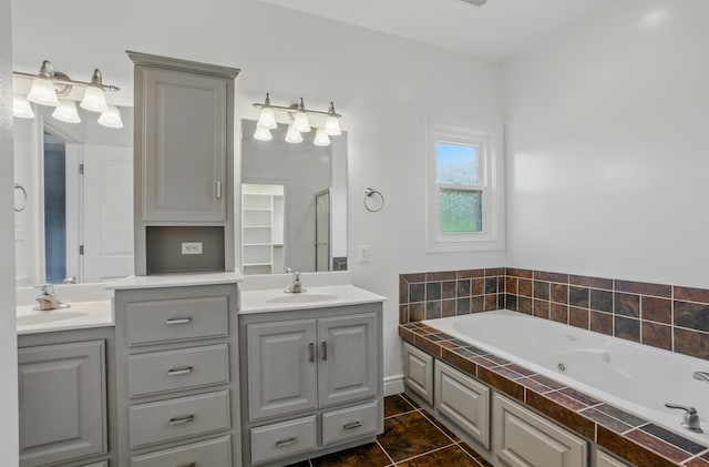 1600 Andretti Cir, Columbia, MO 65201 - bathroom with double vanity and a whirlpool tub