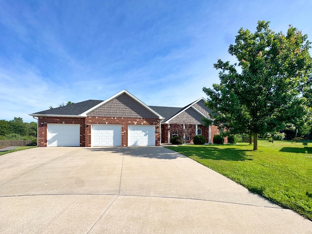 1600 Andretti Cir, Columbia, MO 65201 - view of front of property featuring a garage, a front yard, brick siding, and driveway