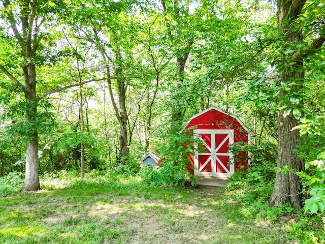 4705 Roemer Rd, Columbia, MO 65202 - view of yard featuring a storage shed