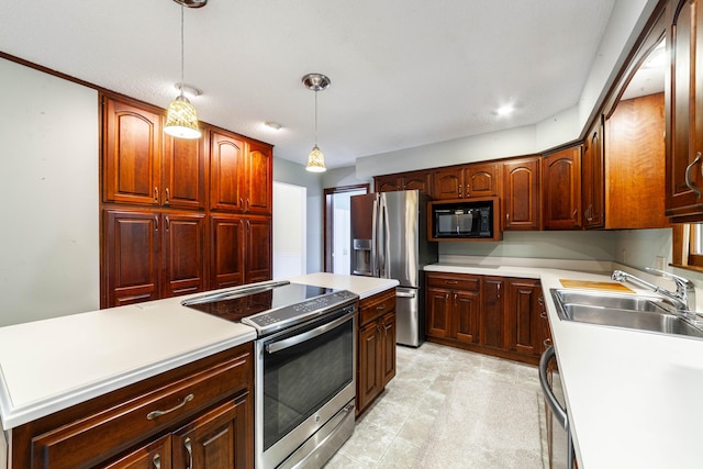 4705 Roemer Rd, Columbia, MO 65202 - kitchen with appliances with stainless steel finishes, light countertops, hanging light fixtures, and a kitchen island
