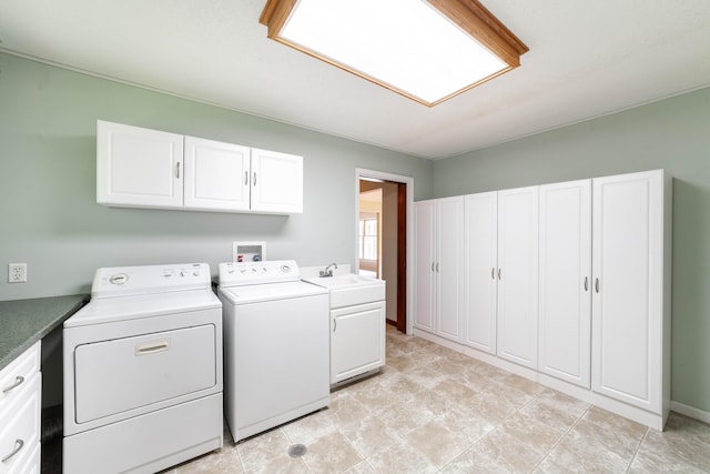 4705 Roemer Rd, Columbia, MO 65202 - washroom featuring cabinet space and independent washer and dryer