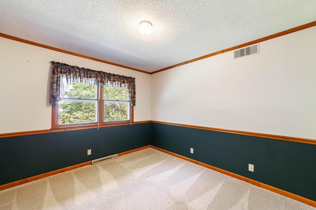 4705 Roemer Rd, Columbia, MO 65202 - spare room featuring a textured ceiling, carpet floors, and crown molding