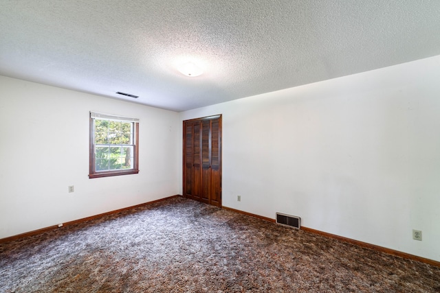 4705 Roemer Rd, Columbia, MO 65202 - unfurnished room with carpet and a textured ceiling