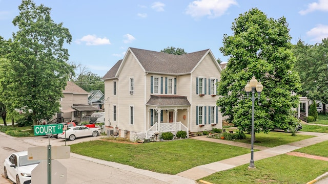 801 Court St, Fulton, MO 65251 - view of front facade featuring a front lawn and roof with shingles