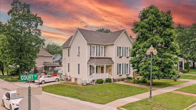 801 Court St, Fulton, MO 65251 - view of front of house with a yard and a shingled roof