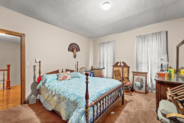 801 Court St, Fulton, MO 65251 - bedroom with light carpet and a textured ceiling