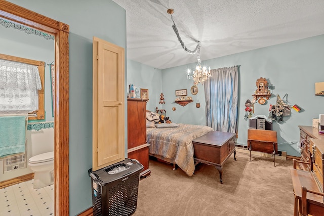 801 Court St, Fulton, MO 65251 - bedroom with a chandelier, a textured ceiling, and ensuite bath