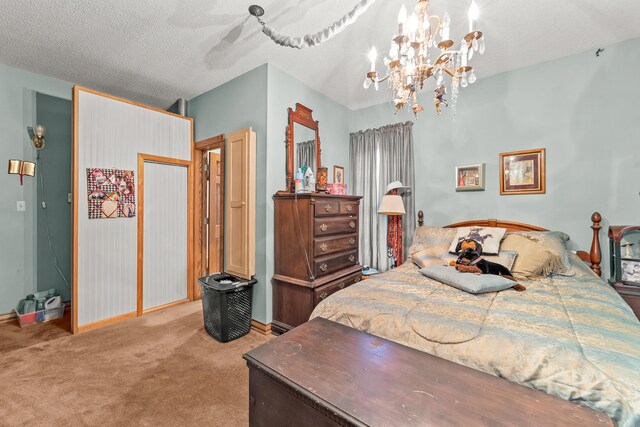 801 Court St, Fulton, MO 65251 - bedroom featuring carpet floors, a chandelier, and a textured ceiling