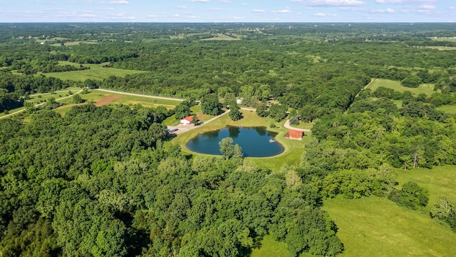 4604 County Road 115, Fulton, MO 65251 - aerial overview of property's location with a heavily wooded area and a nearby body of water