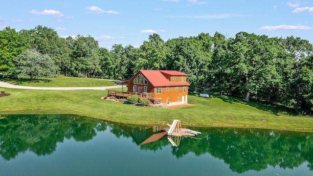 4604 County Road 115, Fulton, MO 65251 - rear view of property featuring a lawn, a deck with water view, and a metal roof