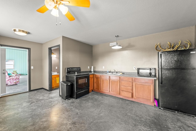 4604 County Road 115, Fulton, MO 65251 - kitchen with black appliances, ceiling fan, finished concrete flooring, and brown cabinetry
