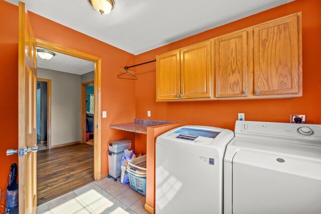 4604 County Road 115, Fulton, MO 65251 - washroom with cabinet space and independent washer and dryer