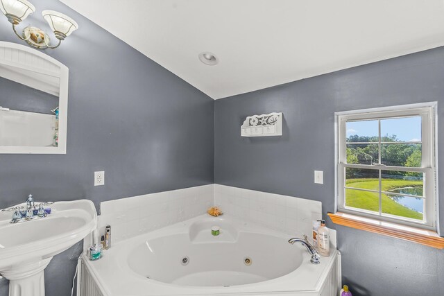 4604 County Road 115, Fulton, MO 65251 - full bath featuring a tub with jets and a sink