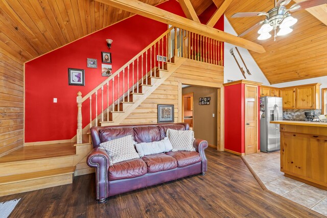 4604 County Road 115, Fulton, MO 65251 - living area featuring stairs, wood ceiling, ceiling fan, wood finished floors, and high vaulted ceiling