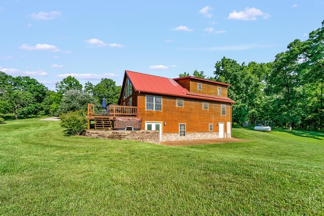 4604 County Road 115, Fulton, MO 65251 - rear view of house with a lawn and a wooden deck
