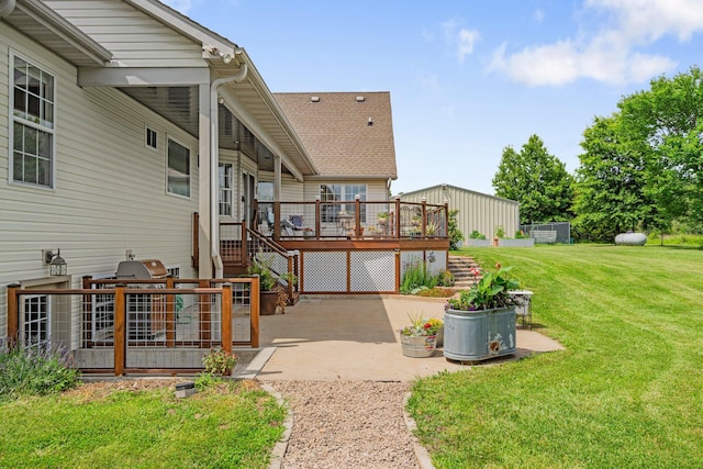 9050 Hartley Rd, Hallsville, MO 65255 - back of house with a patio area, a wooden deck, a lawn, and stairway