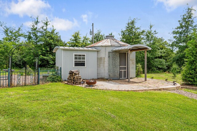 9050 Hartley Rd, Hallsville, MO 65255 - view of outdoor structure featuring an outdoor fire pit