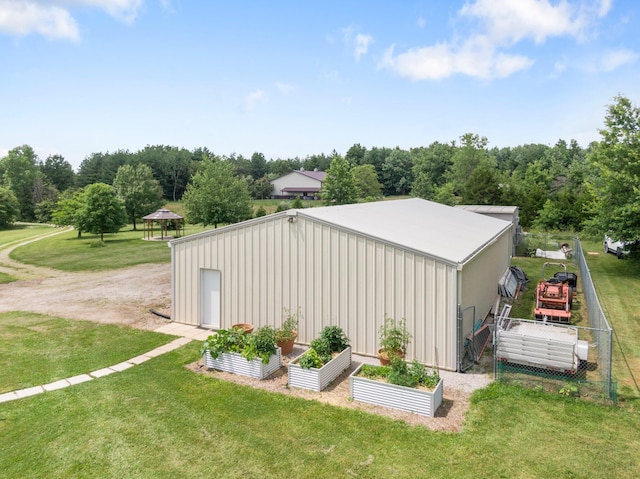 9050 Hartley Rd, Hallsville, MO 65255 - view of outdoor structure featuring a garden