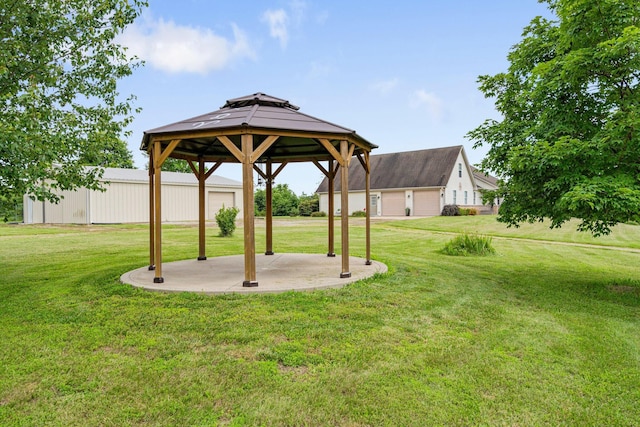 9050 Hartley Rd, Hallsville, MO 65255 - view of green lawn with a gazebo and a patio area
