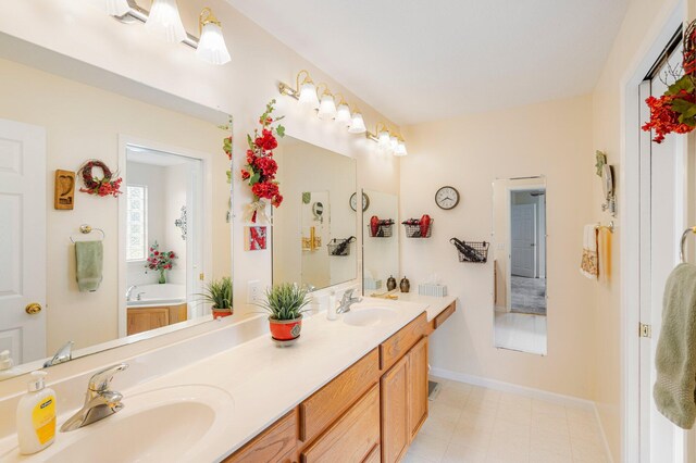 9050 Hartley Rd, Hallsville, MO 65255 - bathroom featuring double vanity and a garden tub