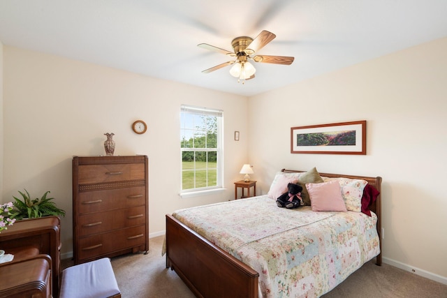 9050 Hartley Rd, Hallsville, MO 65255 - bedroom with light colored carpet and ceiling fan