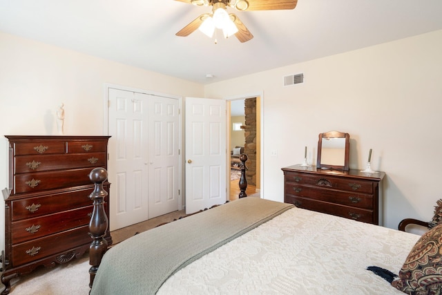 9050 Hartley Rd, Hallsville, MO 65255 - carpeted bedroom with a closet and a ceiling fan