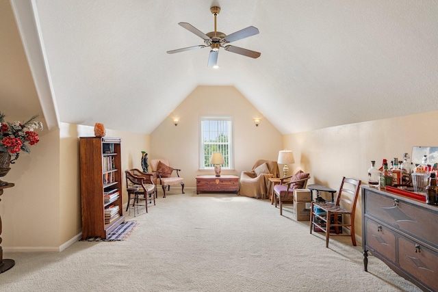 9050 Hartley Rd, Hallsville, MO 65255 - living area featuring carpet, ceiling fan, and lofted ceiling