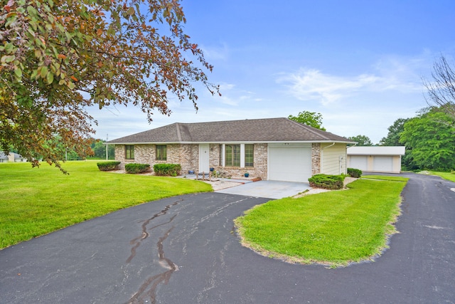 7275 N Route E, Columbia, MO 65202 - view of front of house with a front yard, a shingled roof, and a garage