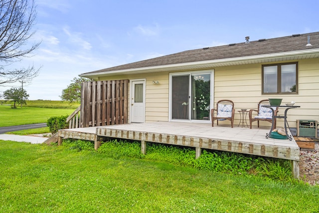 7275 N Route E, Columbia, MO 65202 - back of house with a wooden deck and a lawn