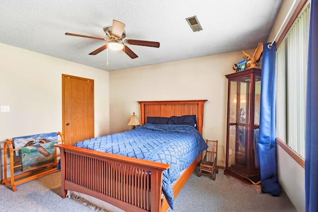 7275 N Route E, Columbia, MO 65202 - carpeted bedroom featuring a ceiling fan