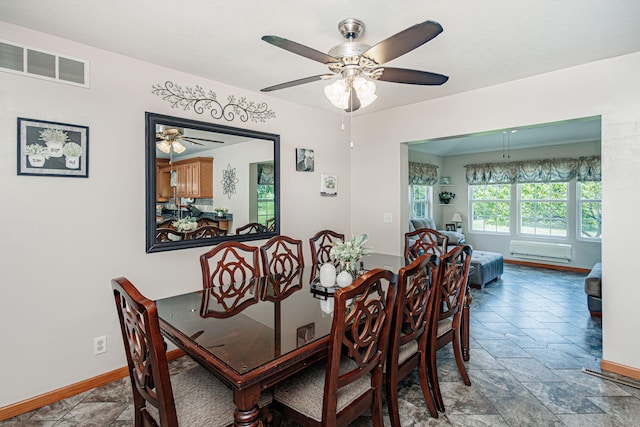 11100 E J B Ln, Hallsville, MO 65255 - dining area with a ceiling fan and a wall mounted air conditioner