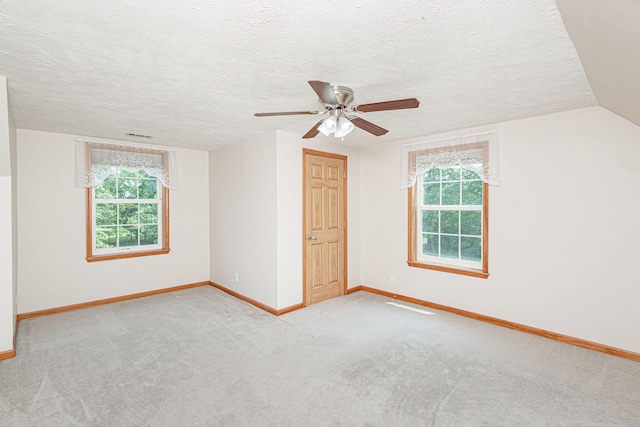 11100 E J B Ln, Hallsville, MO 65255 - empty room featuring carpet floors, ceiling fan, and a textured ceiling