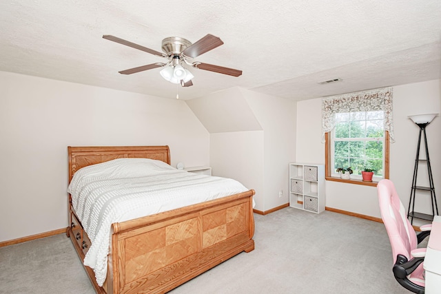 11100 E J B Ln, Hallsville, MO 65255 - bedroom featuring light colored carpet, a ceiling fan, a textured ceiling, and vaulted ceiling