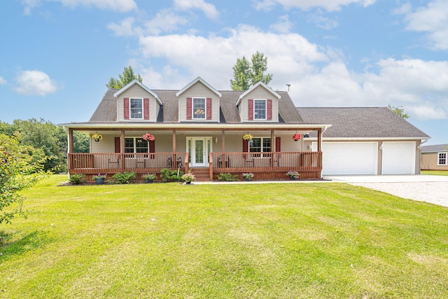 11100 E J B Ln, Hallsville, MO 65255 - view of front of home with driveway, a porch, a garage, a front yard, and a shingled roof