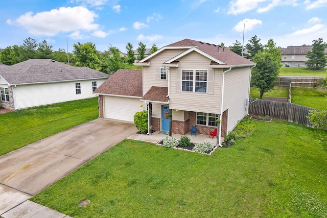 5010 Aspen Ridge Dr, Columbia, MO 65202 - view of front facade with brick siding, driveway, an attached garage, and a shingled roof