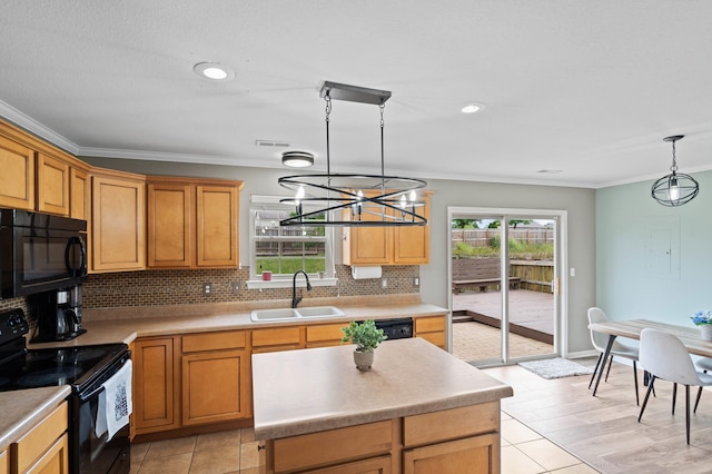 5010 Aspen Ridge Dr, Columbia, MO 65202 - kitchen with black appliances, decorative backsplash, ornamental molding, a chandelier, and pendant lighting