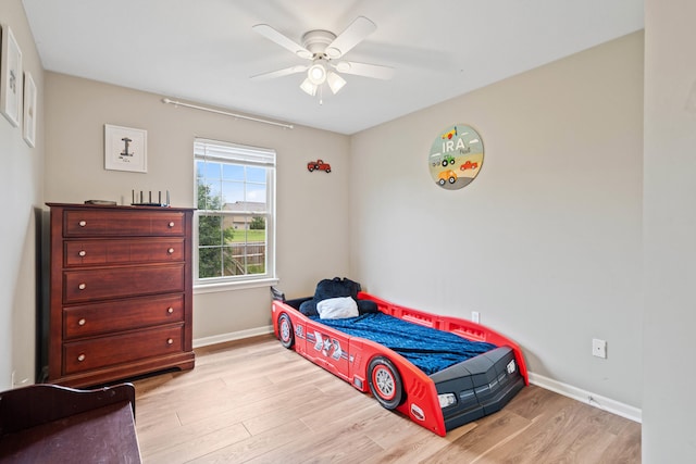 5010 Aspen Ridge Dr, Columbia, MO 65202 - bedroom with wood finished floors and ceiling fan